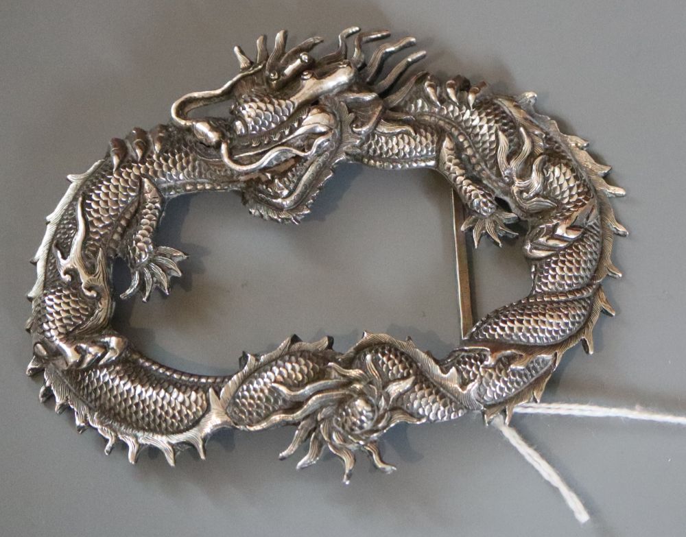 A Chinese white metal dragon buckle?, unmarked, 96mm, 49.1 grams.